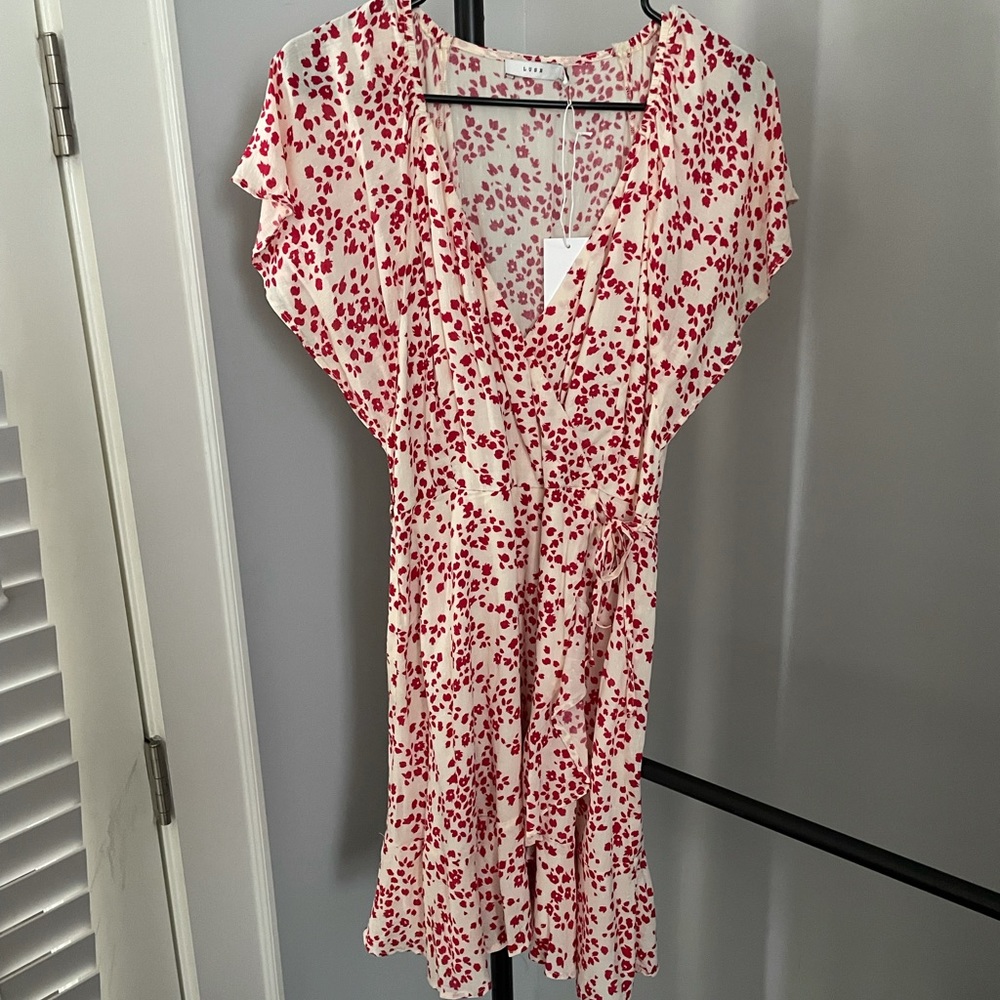 Short sleeved floral wrap dress. Cream and pink. Size M. Tags on. From Lush.